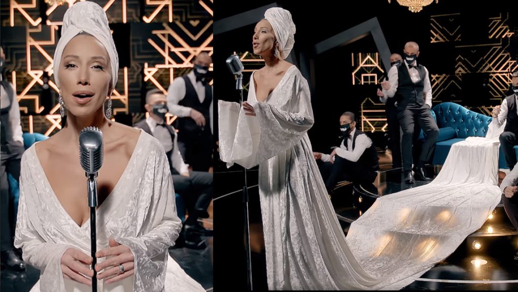 ვიდეო: ქრისტინე შლეიფიანი კაბით და პირბადიანი მამაკაცების გარემოცვაში